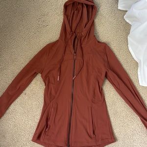 Lululemon hooded define jacket Nulu burnt orange color, US womens size 6